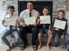 This Family Earned their Black Belts together!